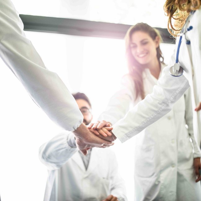 Teamwork of doctors in the office for a meeting