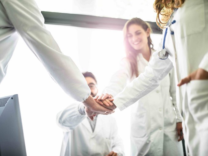Teamwork of doctors in the office for a meeting
